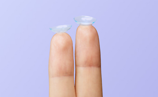 contact lenses on fingers